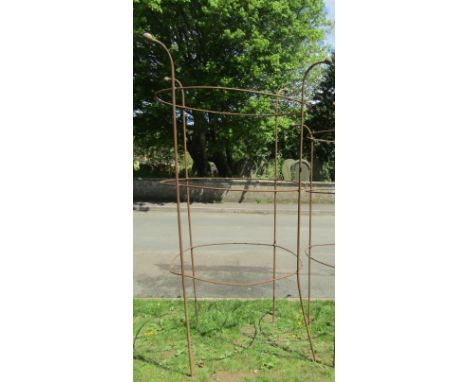 A large good quality weathered heavy gauge iron work obelisk of simple rod and ring construction with ball finials, approxima
