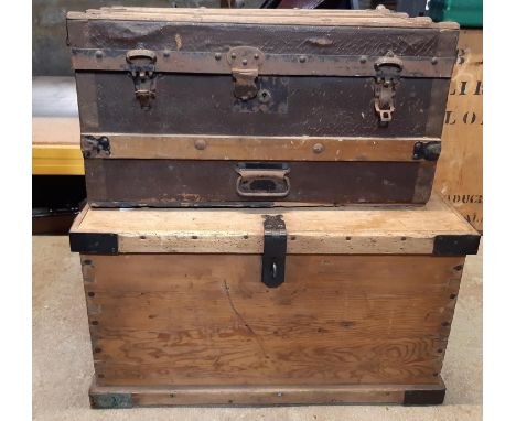 A 19th century pine and steel banded trunk and one other travelling trunk 