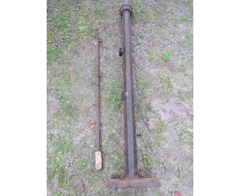 A Victorian cast iron octagonal gate post with pointed cap, stamped Bayliss &amp; Co, Wolverhampton, 203 cm high together wit