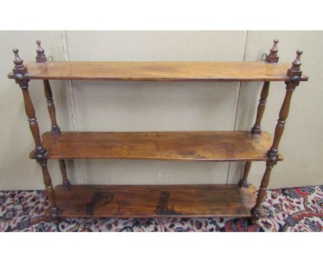 19th century mahogany three tier open wall shelf with turned supports, 74cm wide 