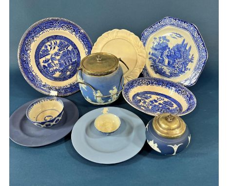 A collection of blue and white ware including a Wedgwood biscuit barrel and cover, with silver plated mounts, further sugar b