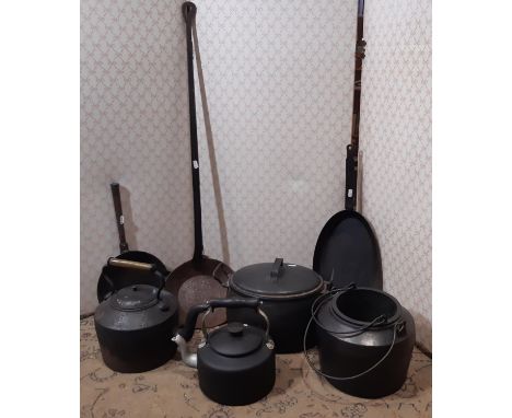 A heavy iron kettle, glue pot, casserole and cover, out sized ladle, etc 