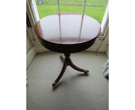 A reproduction Georgian style occasional table, the circular top on turned pillar and tripod, 50 cm diameter, together with a