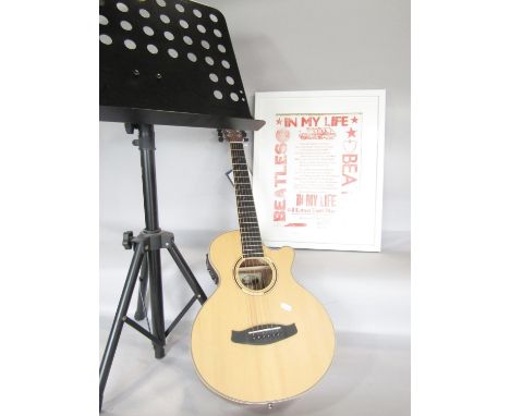 A Tanglewood electric acoustic guitar, Model DBT TCE BW, Serial No KU2010000456, barely used in its carry case, an adjustable