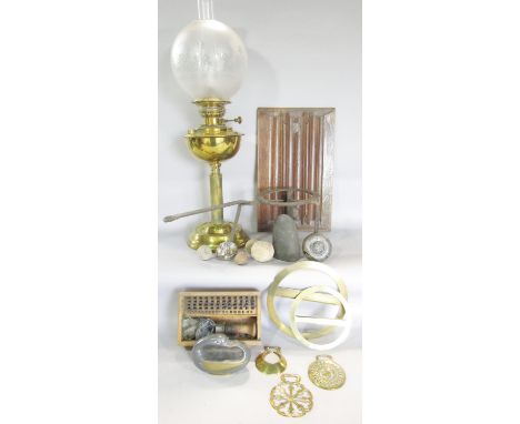 A miscellaneous collection of items including, a brass oil lamp, a wooden linen fold panel, two Georgian brass protractors in