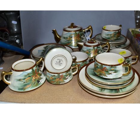 A JAPANESE SOKO-CHINA SIX PLACE TEASET, comprising cups, saucers, side plates, teapot, milk and sugar bowl (missing lid), han