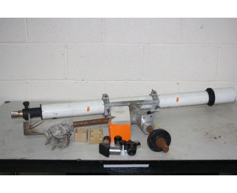 AN UNBRANDED TELESCOPE ON PARTIAL STAND 120cm long with a Celestron 45 degree eye piece ,a 90 degree eye piece and four lense