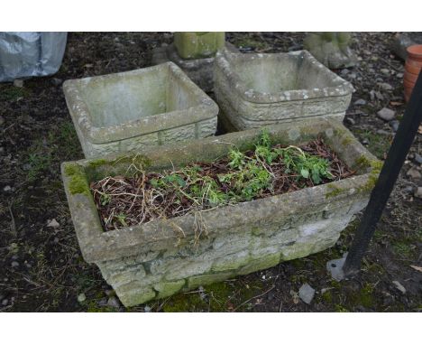 A COMPOSITE BRICK EFFECT PLANTER (crack to corner) width 67cm x depth 28cm x height 27cm together with a pair of similar squa