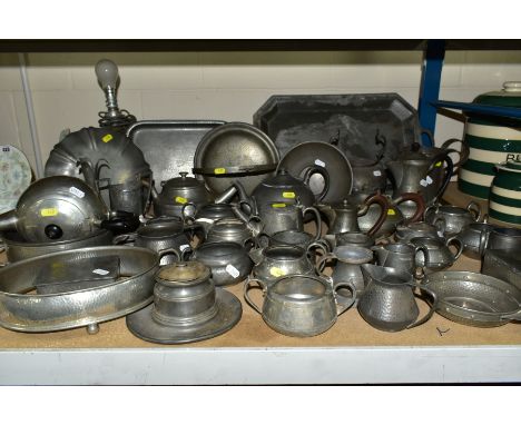 A COLLECTION OF PEWTER WARES etc, mostly of plainished decoration, to include tea pots, milk jugs, sugar bowls, trays, lamp, 