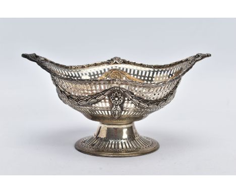 A LATE VICTORIAN SILVER PIERCED BONBON DISH, of an oval form, detailed foliate swags on an openwork bowl, detailed foliate an