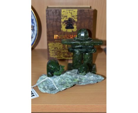 A BOXED INUKSHUK GREEN SOAPSTONE INUIT ABSRACT FIGURE ON A RECTANGULAR PLINTH, height 10.5cm, together with two Canadian/Inui