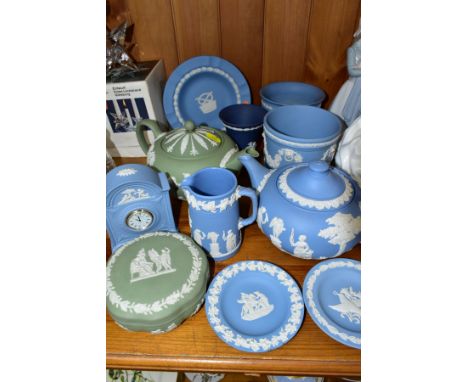 A SMALL COLLECTION OF WEDGWOOD JASPERWARE, comprising in light blue, two circular pin dishes, a squat circular tea pot, a con