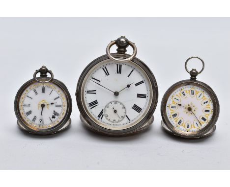 THREE SWISS SILVER OPEN FACED POCKET WATCHES, to include a larger pocket watch with a white dial, Roman numerals, seconds sub