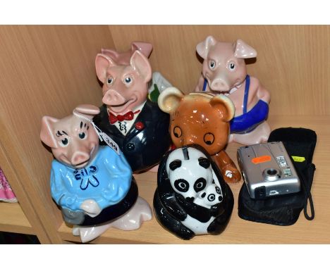 A SET OF FOUR WADE NATWEST PIGGY BANKS, (no Woody) sister has a chip to the back of her feet and brother has a chip to the co