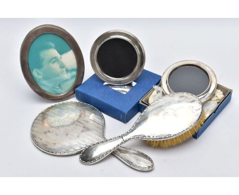 A SELECTION OF ITEMS, to include a silver engine turn designed hairbrush and matching handheld mirror, each piece with a vaca