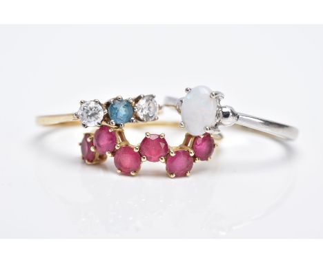 THREE GEM SET DRESS RINGS, the first a 9ct gold six stone ring, designed with a row of claw set, circular cut pink tourmaline