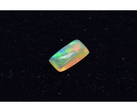 A LOOSE OPAL RECTANGULAR SHAPED CABOCHON CUT STONE, measuring approximately 12.0mm x 6.5mm, weighing approximately 1.95ct