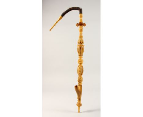 A 19TH CENTURY CONTINENTAL RHINOCEROS HORN PIPE. 2ft 4ins long.