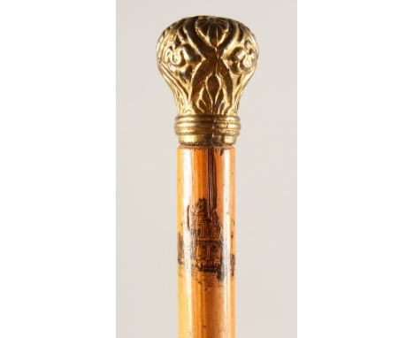 A SLENDER WALKING STICK, with painted shaft and gilt metal pommels. 35.5ins long.