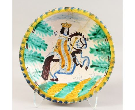 A DELFT POTTERY COLOURED CIRCULAR CHARGER with a portrait of William III on horseback. 13.5ins diameter ( bears old repair).