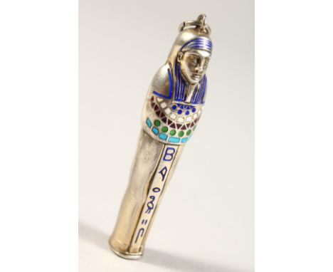 A SMALL SILVER AND ENAMEL EGYPTIAN MUMMY. 5.5cms long.