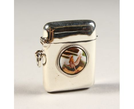 A SILVER VESTA, with a circular enamel of young lady.