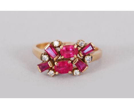 A YELLOW GOLD RUBY AND DIAMOND RING.