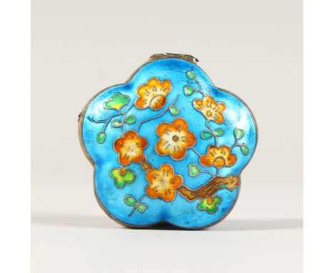 A SILVER AND BLUE ENAMEL SHAPED COMPACT.