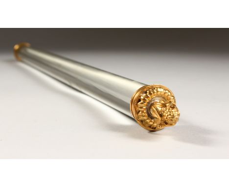 A RARE LONG GLASS MAGNIFYING GLASS ROLLING PIN, with ormolu ends. 18ins long.