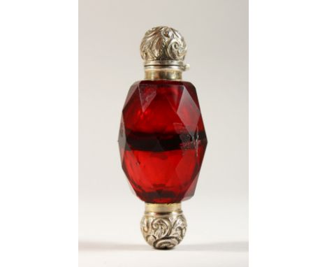 A DOUBLE ENDED RUBY SCENT BOTTLE, with silver top.