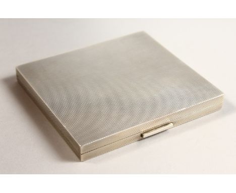 AN ENGINE TURNED SILVER CIGARETTE CASE. 8cms x 9cms.  Birmingham 1944.