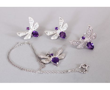 A SILVER AND AMETHYST SET BUTTERFLY PENDANT, RING AND EARRINGS.