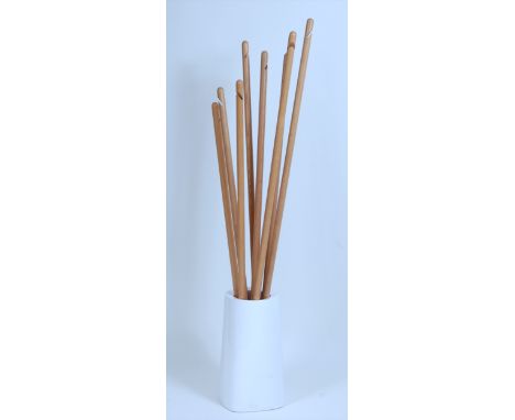 Luca Nichetto (b.1976) for Bosa - an Essence Otto Range coat-rack, comprising eight light oak turned hangers, each with cut-o