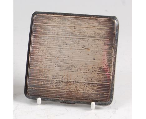 An Art Deco silver engine turned pocket cigarette case, having gilt-washed interior, stamped 925, 3.7oz, 8.3 x 8.3cm