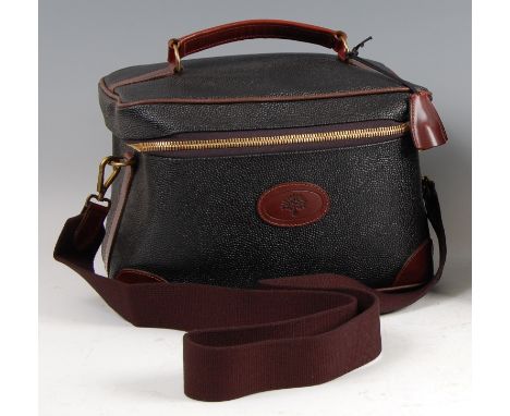 A contemporary Mulberry travelling vanity bag, having Scotch-grain exterior, tan leather handle and strapwork detail, gilt br