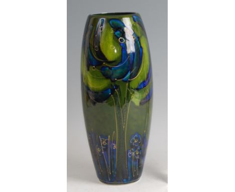 A contemporary Art Pottery vase by Anita Harris, of slightly ovoid form, underglaze decorated with trees in tones of green an