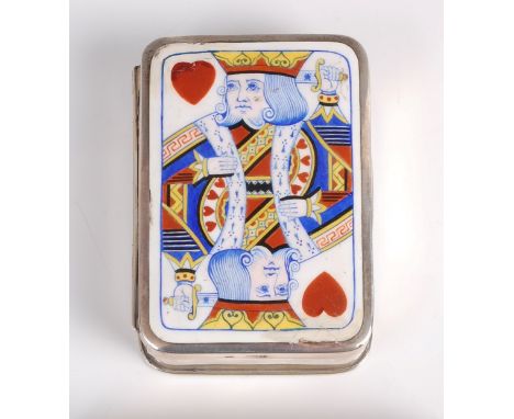A silver and enamel table playing card box, the hinged cover inset with enamel decorated king of hearts, enclosing plain gilt