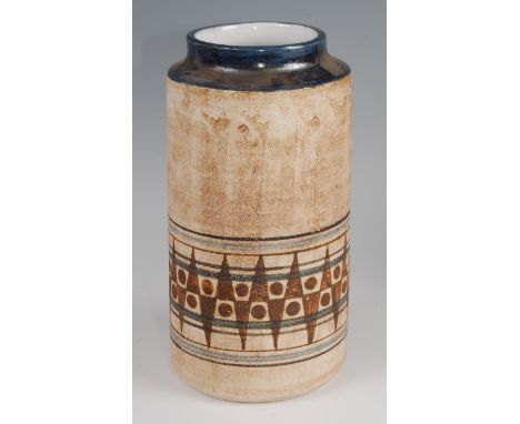 A 1970s Troika cylindrical pottery vase, having stylised geometric lower banded decoration, painted mark for Troika Cornwall 