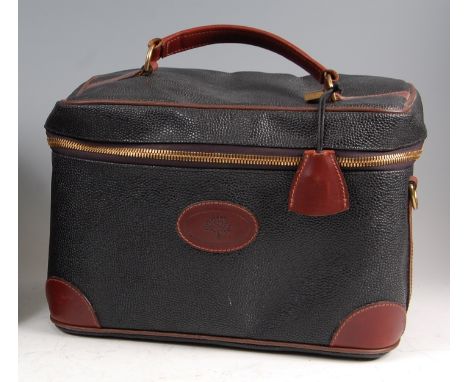 A contemporary Mulberry travelling vanity bag, having Scotch-grain exterior, tan leather handle and strapwork detail, gilt br