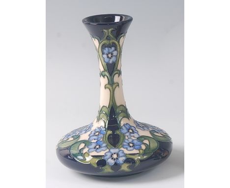 A modern Moorcroft pottery vase in the Florence pattern, designed by Rachel Bishop, the waisted neck to lower bellied body, i