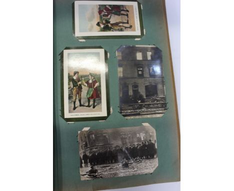 Postcards in two albums - including four real photographic cards of the Siege of Sydney Street, Houndsditch, Scots Guards fir