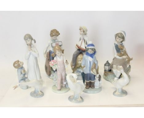 Collection of nine Lladro porcelain figures - including boy with boat, 'Musically Inclined', girl with dog, etc CONDITION REP