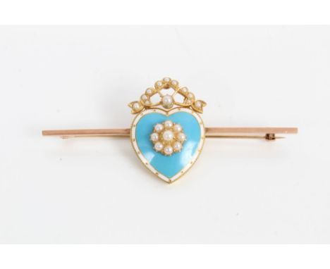 Edwardian seed pearl and enamel heart-shaped brooch with a  central seed pearl cluster on turquoise blue ground with white bo