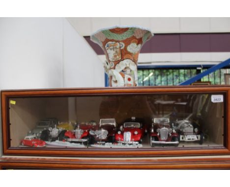 Glass display cabinet - containing vintage cars, aeroplanes, ships, miniature, etc - models mostly are Burago (qty)