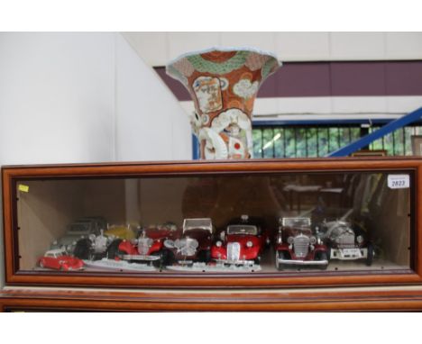 Glass display cabinet - containing vintage cars, aeroplanes, ships, miniature, etc - models mostly are Burago (qty)