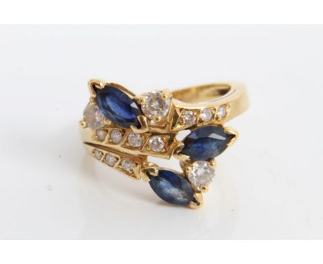 Portuguese gold (800) sapphire and diamond crossover ring.  Size M½ CONDITION REPORT Total gross weight approximately 5.9 gra