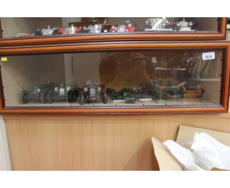 Glass display cabinet - containing three vintage cars by Burago and selection of miniature workshop tools and equipment