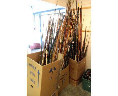 Large quantity of vintage and modern fishing rods in glass fibre, cane and other materials - mostly for sea fishing