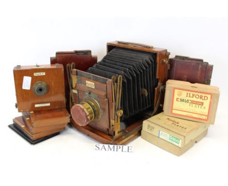 Two mahogany plate cameras - one a Lancaster Ajax, the other a large Sanderson field camera with Taylor Hobson lens, together