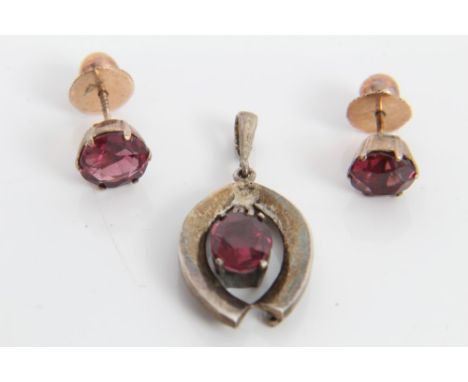 Pair Indian red stone stud earrings - possibly ruby or garnet, in yellow metal setting and similar pendant in white metal mou